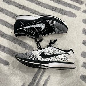 Nike flyknit racer black tongue